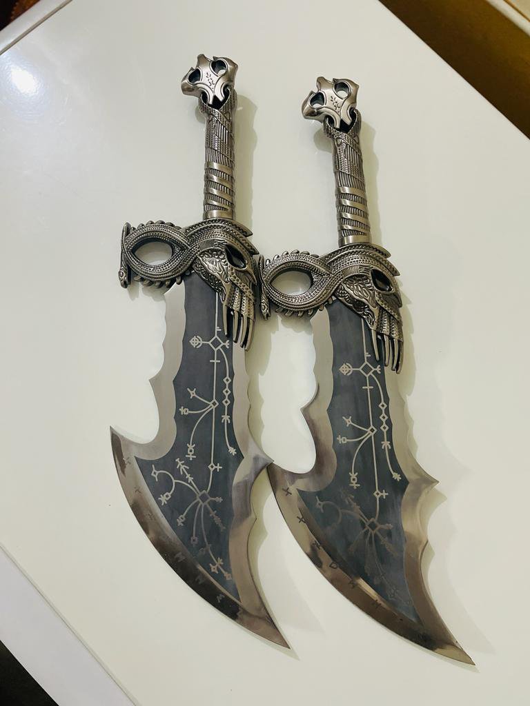 God of War-The Blades of Chaos are a pair of chained blades image 2